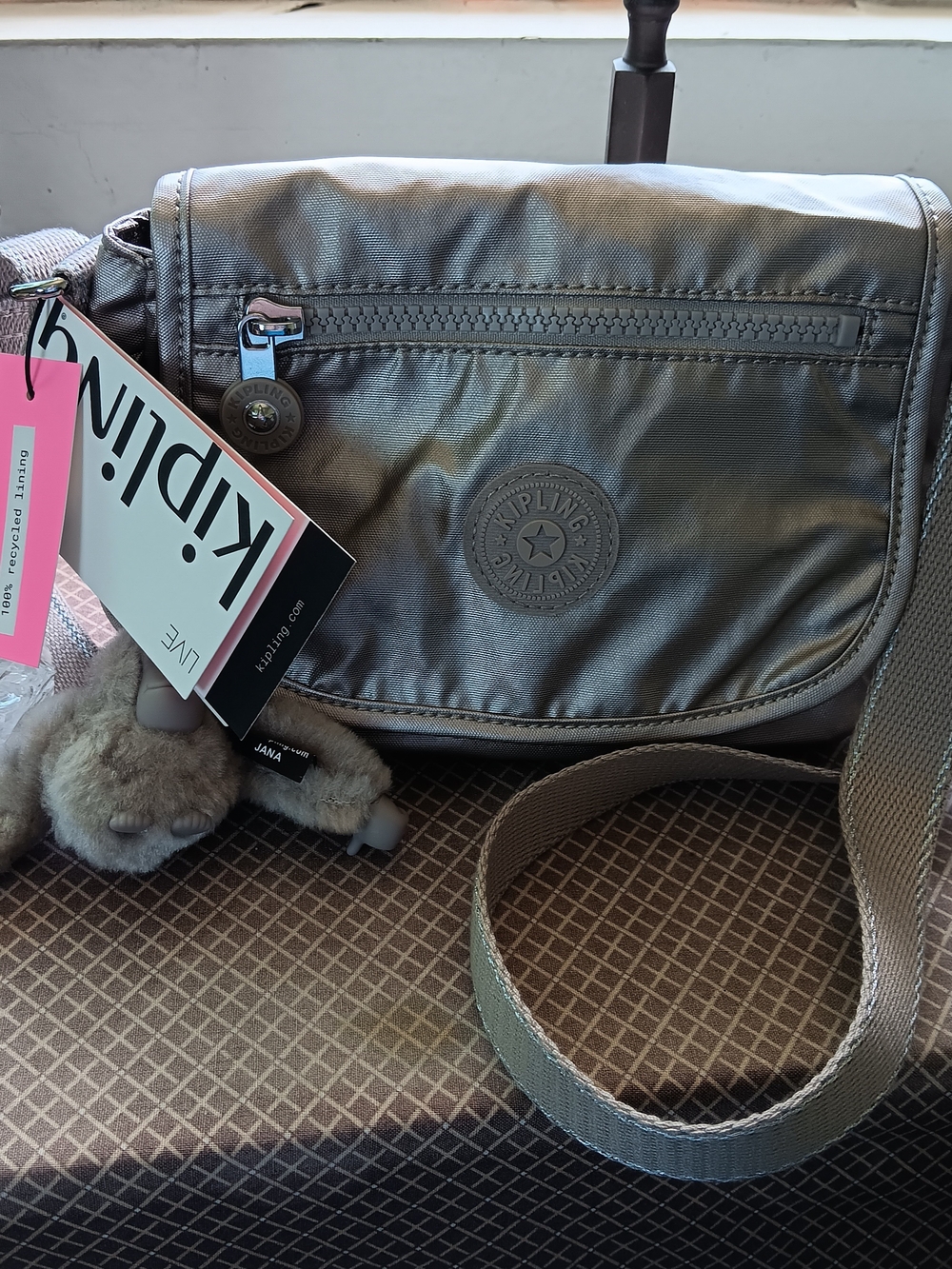 Kipling Metallic, champagne Crossbody Bag w/ Monkey Charm & Tags, Never Used..